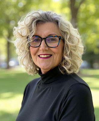 Portrait of Catie Morales, Associate Broker/REALTOR®
