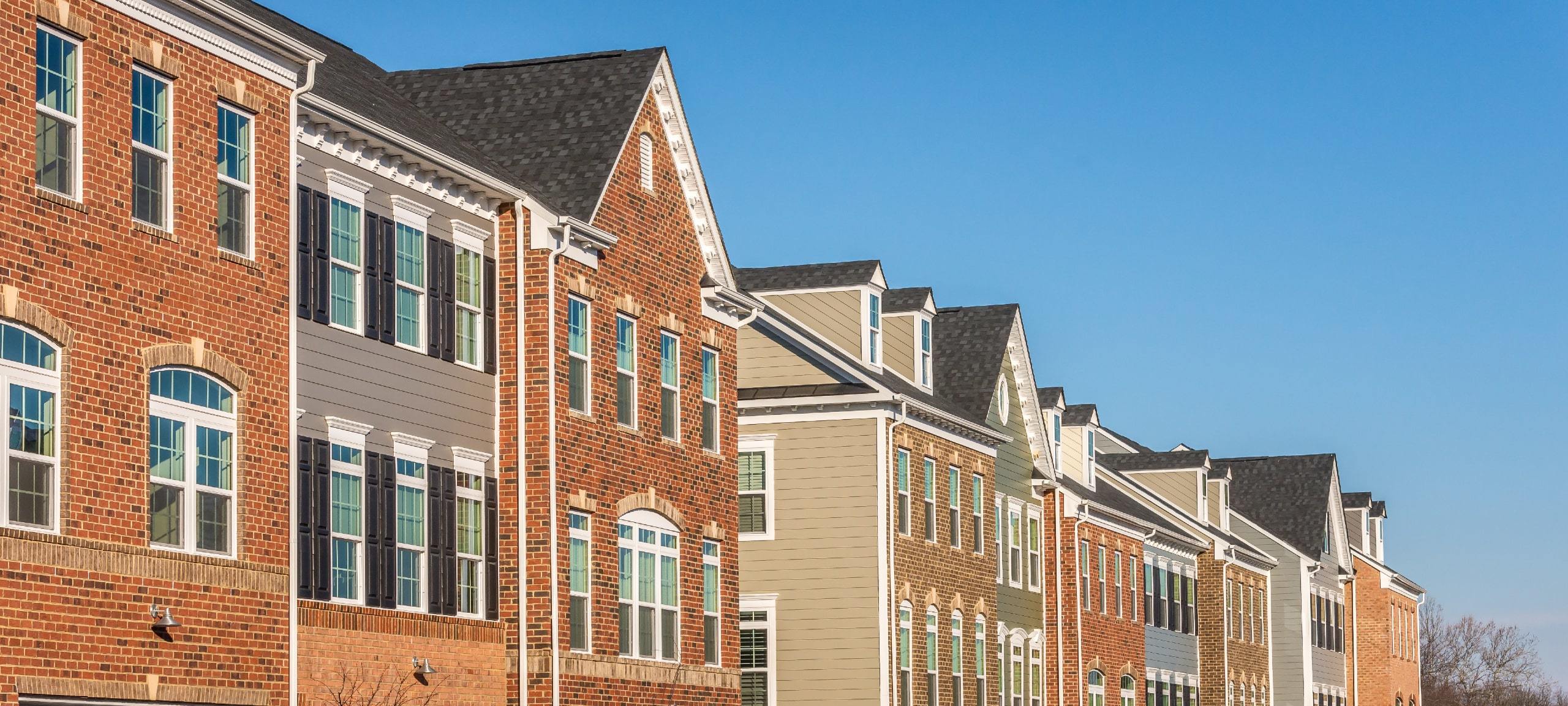 Brick townhomes in residential area, typical of Owings Mills, Maryland